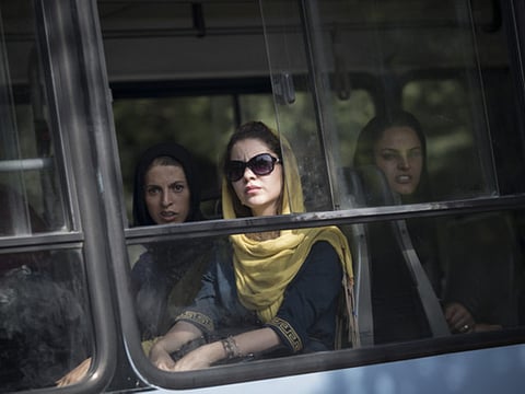 For Iranians, hope tinged with caution