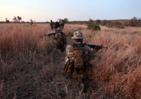 A South African National Defence Force soldier takes part in a training exercise as part of Operation Rhino in the Kruger National Park, South Africa's flagship national wildlife park on 19 July 2011.
