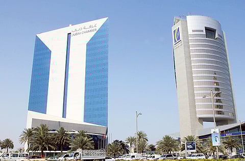 The Dubai Chamber of Commerce and Industry building (left) as seen from the Dubai Creek.