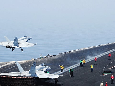 An F/A-18E Super Hornet attached to the Tomcatters of Strike Fighter Squadron (VFA) 31 takes off from the flight deck of the aircraft carrier USS George H.W. Bush (File image)