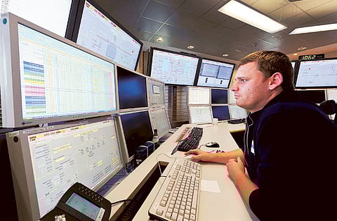 A coder at work... This is the sort of skill sets banks in Asia are on the lookout for. (Picture used for illustrative purposes.)