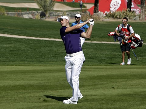 Triple champion Martin Kaymer leads in Abu Dhabi