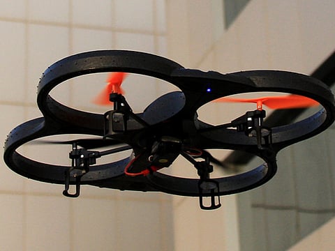 Drone damages police car, world swimming champ who flew it lands in court