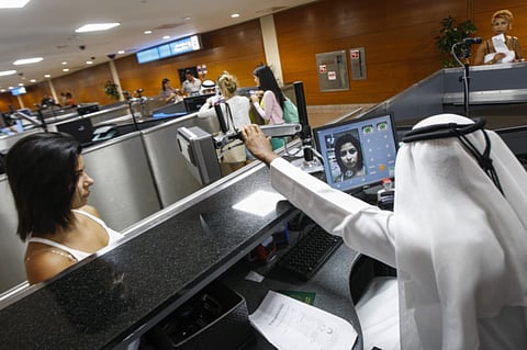 [Illustrative image] A passenger going through an eye scan on arrival at Dubai airport Terminal 1