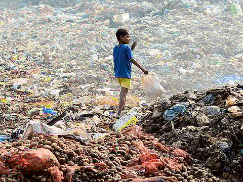 They sift through piles of trash for a pittance