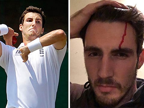 England star Steven Finn walks into street sign while texting