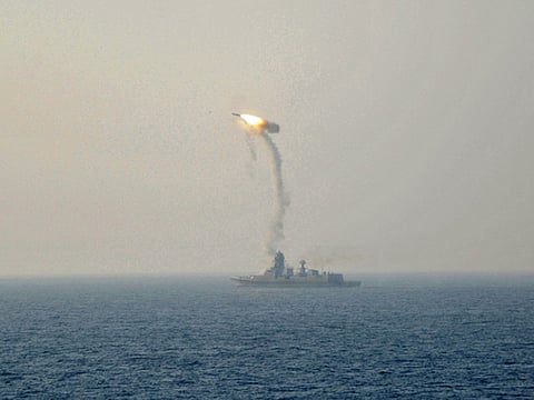 SUPERSONIC CRUISE MISSILE: A BrahMos missile is test-fired from newly-commissioned indigeneous guided missile destroyer the INS Kochi, India.