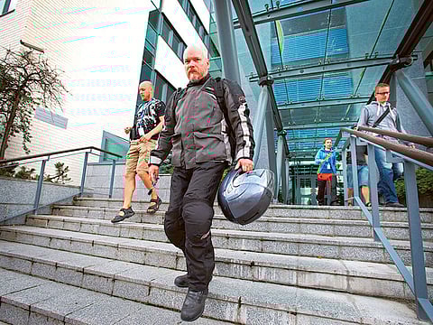 File picture of workers leaving an office of software giant Microsoft. Will the great American job surge of recent years end in a damp squib?