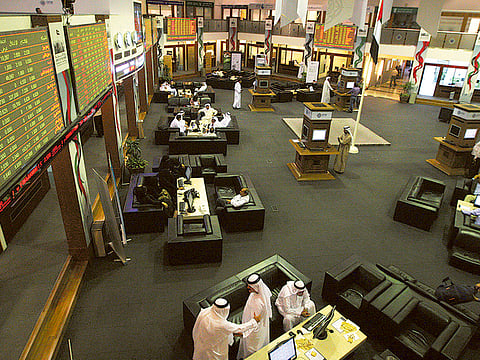 File photo: Traders at the Dubai Financial Market.