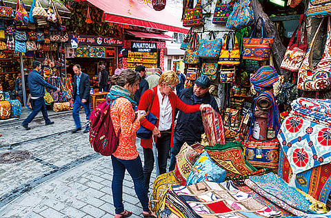 Turkey's gross reserves are well below the recommended adequacy range, and net international reserves are negative when foreign-exchange swaps with the central bank are excluded.
