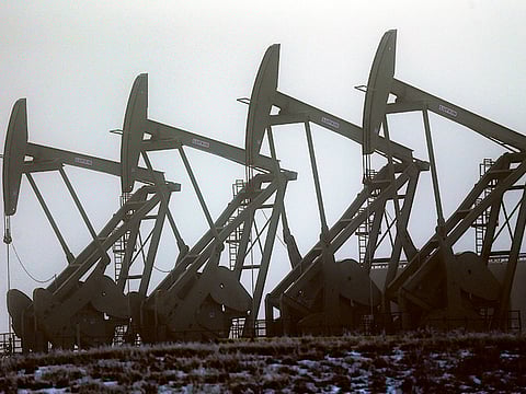Oil pump jacks in Williston, North Dakota. The U.S. Energy Information Administration (EIA), forecast that global oil demand would recover through the end of 2021.
