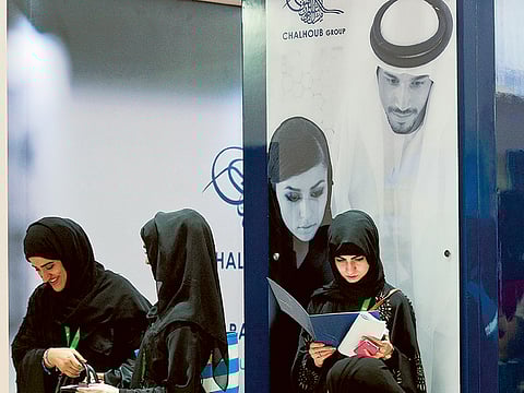 Emiratis job seekers visit Chalhoub group stand Careers UAE at Dubai World Trade Centre and Exhibiti