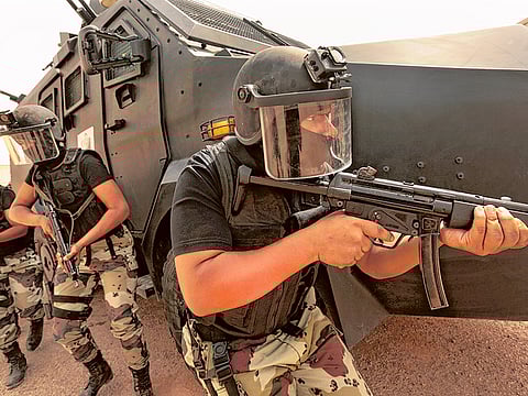 File picture shows members of the Saudi Arabia Riyadh Swat team practice tactical manoeuvres. 