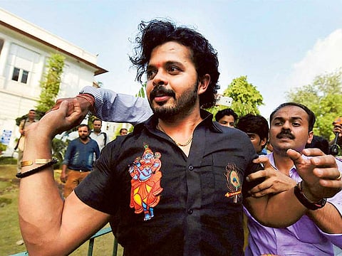 File photo: Cricketer S Sreesanth coming out of the Patiala House Courts in New Delhi after a trial court discharged him in the Indian Premier League 2013 spot-fixing scandal on Saturday. Sreesanth and 41 others have been discharged by the court in the case. 
