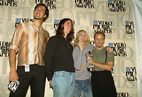 In this Sept. 2, 1993 file photo, Nirvana band members, Chris Novoselic, from left, Dave Grohl, and Kurt Cobain.