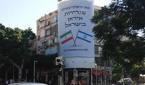 Banner advertising Iranian embassy opening in Tel Aviv goes viral