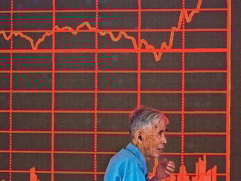 World stocks held near record highs on Monday as generally better data and earnings bolstered sentiment.