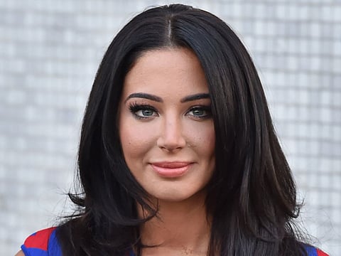 Undercover UK reporter charged over pop star’s trial