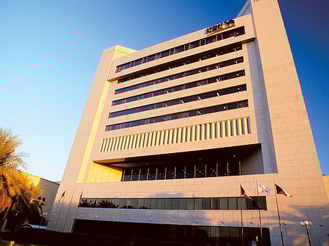 The National Bank of Kuwait (NBK) in Kuwait City. It is estimated that expats have taken out a total of 4 billion Kuwaiti dinars in loans.