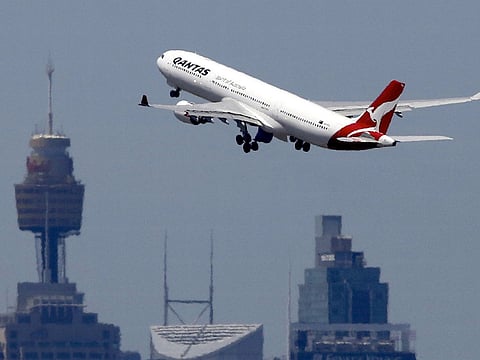 A Qantas Airways Airbus A330-300 jet takes off from Sydney International Airport.