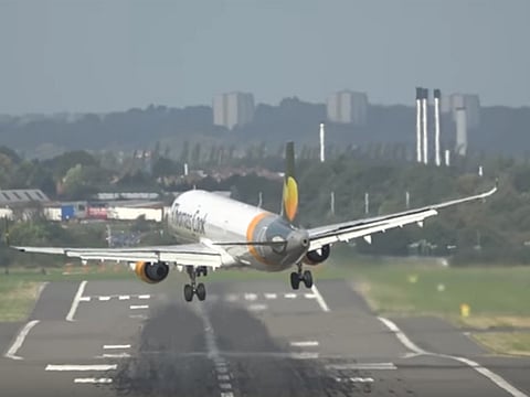 Watch: Pilot aborts landing in high wind