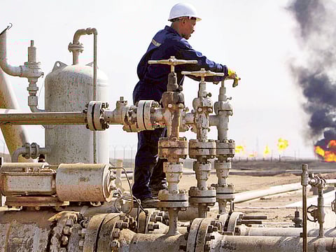 File picture of the Rumaila oil refinery near Basra, Iraq. The government has repeatedly agreed to production cuts but not delivered.