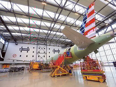 An Airbus A320 on the final assembly line at the factory in Hamburg, Germany. Airbus SE is under pressure to carry out its job-cutting plan as the prospects for the aviation industry deteriorate.