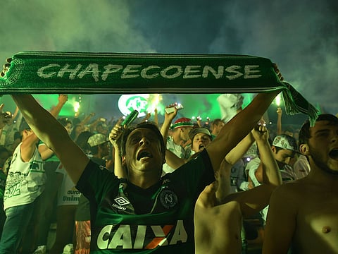 Brazil's Chapecoense football club fans pay tribute to the players killed in a plane crash in 2016.