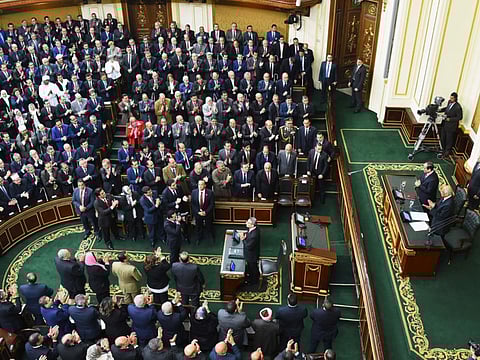 In this file 2019 picture, President Al Sissi and Ali Abdul Al, speaker of Egypt’s parliament, receive a standing ovation during the former’s visit to the parliament headquarters in Cairo.
