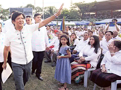 File photo: Senator Ferdinand “Bongbong” Marcos Jr., the son of the late Philippine strongman Ferdinand Marcos, waves to the crowd be he talks at a gathering of a religious group in suburban Quezon city, north of Manila, Philippines on Sunday. Five candidates are running for President in the coming elections this May. 