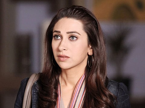 Karisma Kapoor dodges questions on divorce, says not ready for films