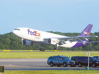 A FedEx cargo plane at Stansted Airport in Essex, UK. 