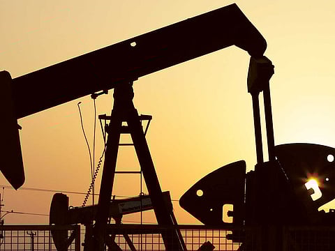 Pumps work in the desert oilfields of Sakhir, Bahrain. 