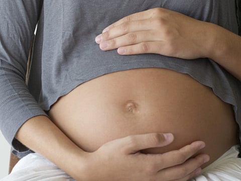 A pregnant woman. For illustrative purposes.