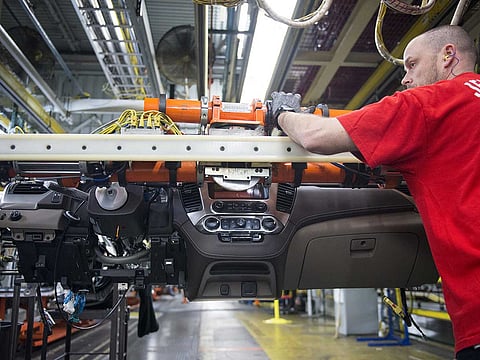 An employee on the production line at the General Motors assembly plant in Arlington, Texas. Latest Labour Department data showed employers are rehiring workers faster than economists anticipated, at least as of mid-June.