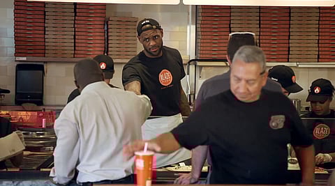 LeBron James goes undercover as pizza store employee
