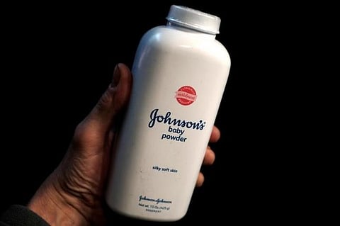 A bottle of Johnson and Johnson Baby Powder is seen in a photo illustration taken in New York, February 24, 2016.