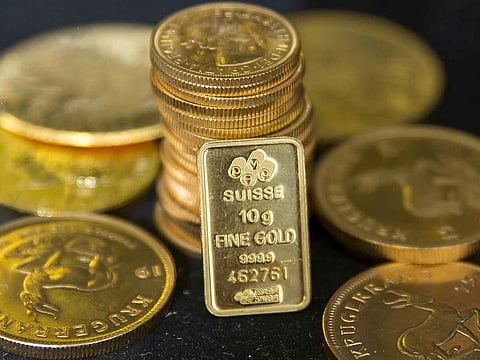 Gold bullion is displayed at Hatton Garden Metals precious metal dealers in London