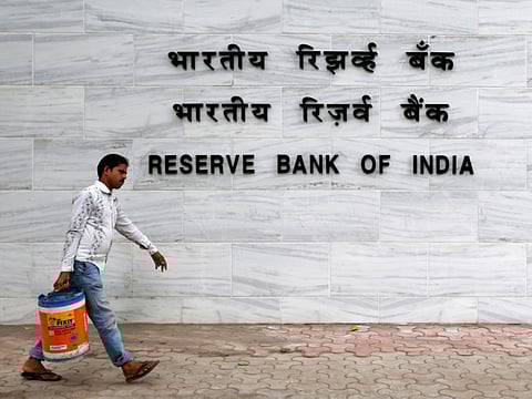 File photo: A man walks past the Reserve Bank of India (RBI) head office in Mumbai.
