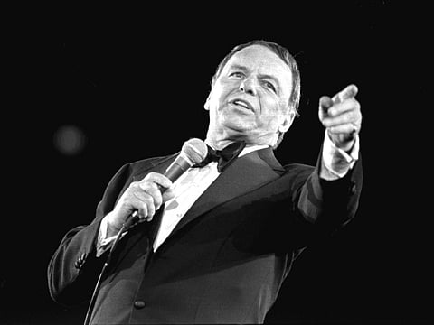 This April 9, 1974 file photo shows Frank Sinatra performing at the Nassau Veterans Memorial Coliseum, in Uniondale, N.Y.