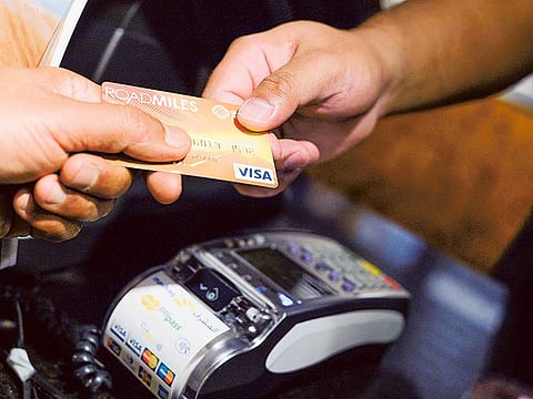 Credit card processing giant Visa Inc. said its fiscal third quarter profit fell by 23% from a year ago.
