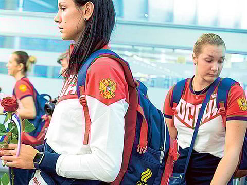 Two Russian athletes wait to check in before their team’s departure to the 2016 Rio Olympics. The reputation of the sporting superpower's anti-doping system has come in for major flak in recent times.