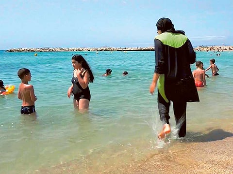 Locally known as the Sharia-compliant swimsuit, the burkini is a full-body garment that also covers the head. 
