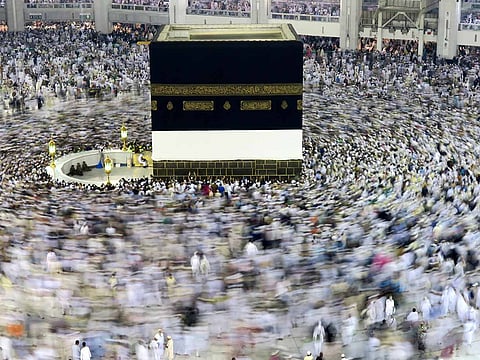 Pilgrims circle the Kaaba at the Grand Mosque in Makkah, Saudi Arabia.