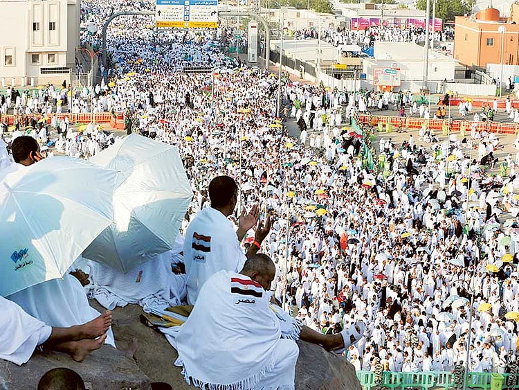 Muslim pilgrims gather on the plains of Arafat during the annual Hajj, outside Mecca.  