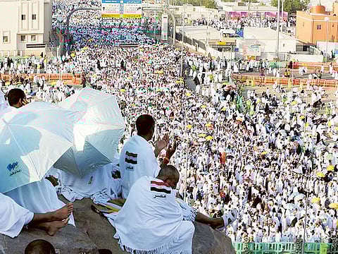 Muslim pilgrims gather on the plains of Arafat during the annual Hajj, outside Mecca.  