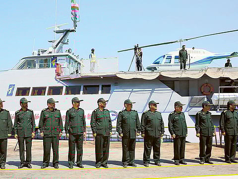 Members of Iran’s Revolutionary Guard stand in front of a newly inaugurated high-speed catamaran, in the port city of Bushehr, in a file photo. “This hypersonic ballistic missile was developed to counter air defence shields,” General Amirali Hajizadeh, the commander of the Islamic Revolutionary Guard Corps aerospace unit, was quoted as saying by Fars news agency.