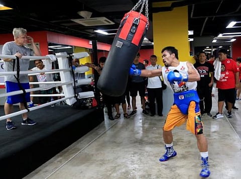 Senator and boxing champion Manny 'Pacman' Pacquiao trains