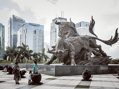 A sculpture of bulls at the entrance to the Shenzhen Stock Exchange. As economies worldwide reopen post-lockdowns, the recovery is seen as increasingly uneven in emerging markets.