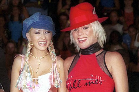 Pink says Christina Aguilera tried to punch her